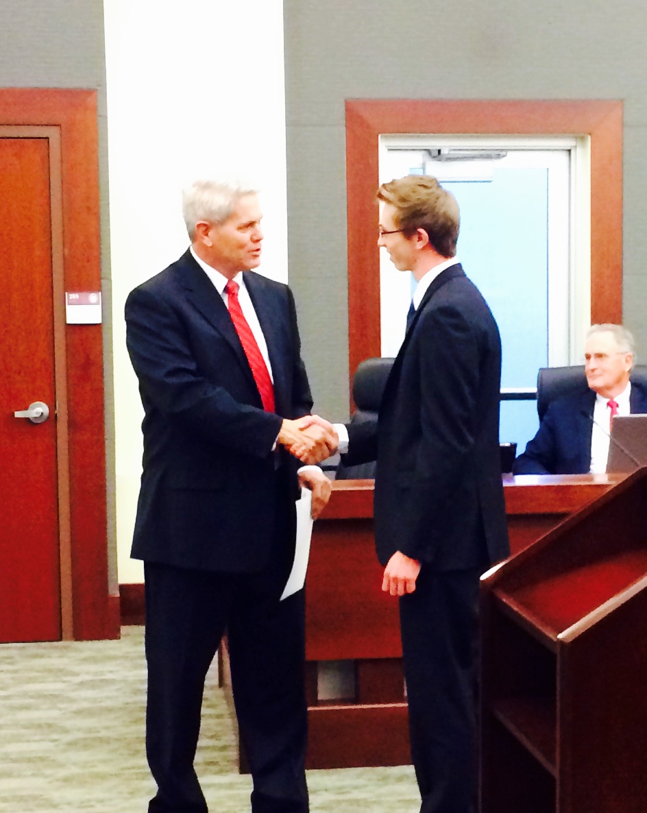 Hunter Jensen Scholarship 2014 shaking hands